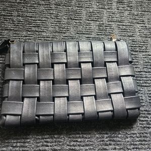 Faux leather crisscross clutch